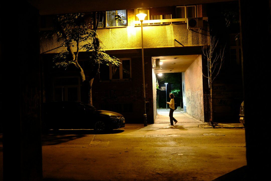 person walking alone at night